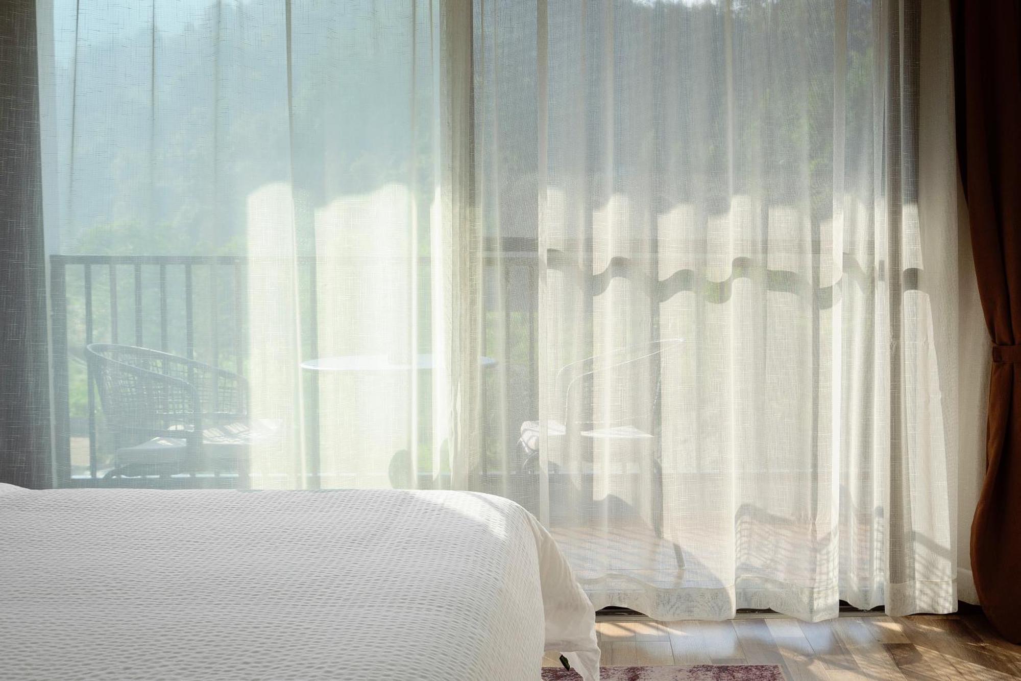 ז'אנגג'יאג'י Whispering Mountains Boutique Hotel מראה חיצוני תמונה